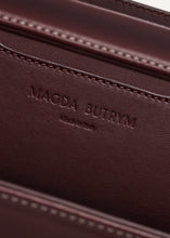 Load image into Gallery viewer, Apolonia bag in burgundy leather with flower charm