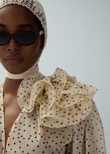 Crochet bonnet in cream