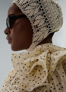 Crochet bonnet in cream