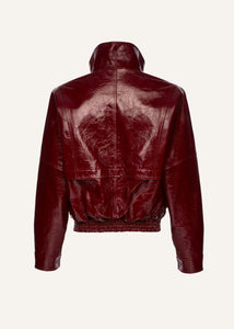 Vintage patent leather bomber jacket in bordeaux