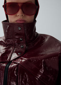 Vintage patent leather bomber jacket in bordeaux