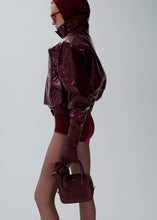 Load image into Gallery viewer, Vintage patent leather bomber jacket in bordeaux
