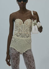 Load and play video in Gallery viewer, Lace crochet bustier bodysuit in cream
